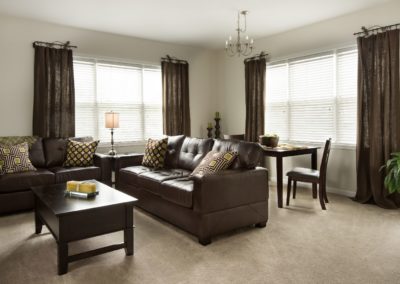decorated living room of a Warminster apartment rental at The Station at Bucks County
